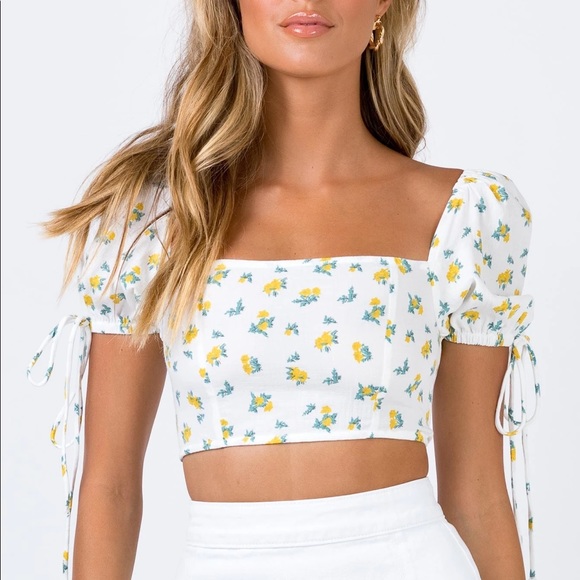 white top with yellow flowers